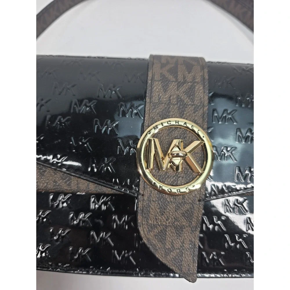 Michael Kors Greenwich medium logo-embossed patent leather shoulder bag in black